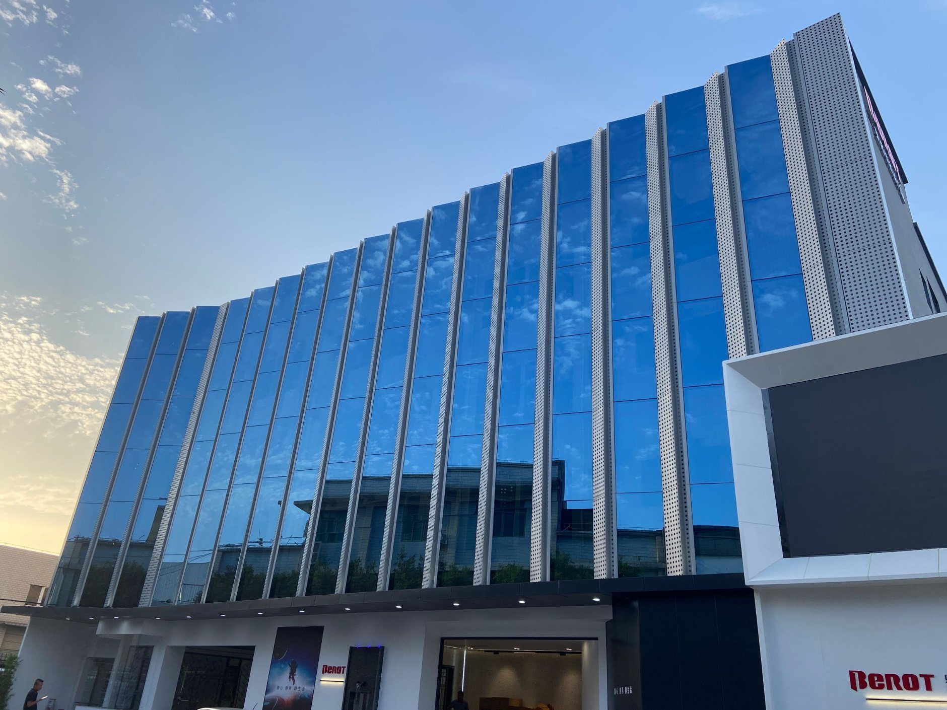Modern glass curtain wall system on a commercial building in Accra Ghana