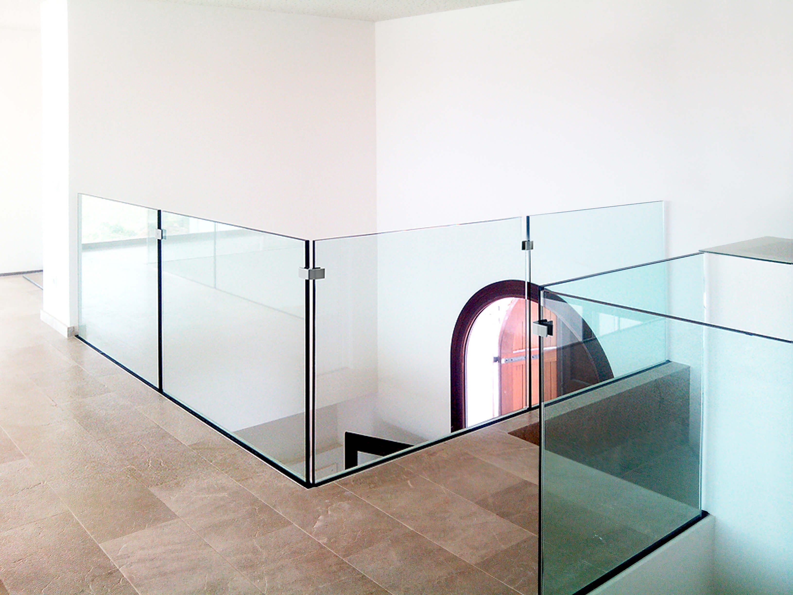 Glass railing staircase design — luxury Ghana property